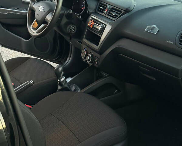Чорний Кіа Ріо, об'ємом двигуна 1.4 л та пробігом 136 тис. км за 6900 $, фото 17 на Automoto.ua