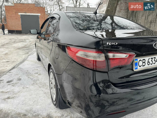 Черный Киа Рио, объемом двигателя 1.4 л и пробегом 155 тыс. км за 7500 $, фото 14 на Automoto.ua