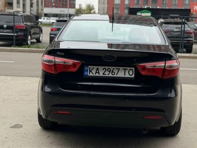 Чорний Кіа Ріо, об'ємом двигуна 1.4 л та пробігом 202 тис. км за 6900 $, фото 3 на Automoto.ua