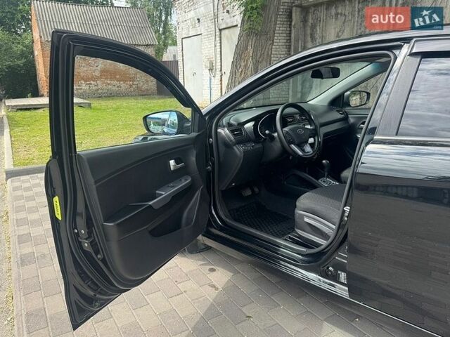 Чорний Кіа Ріо, об'ємом двигуна 1.4 л та пробігом 155 тис. км за 7500 $, фото 19 на Automoto.ua