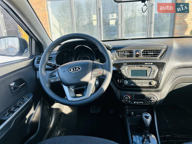 Чорний Кіа Ріо, об'ємом двигуна 1.59 л та пробігом 93 тис. км за 8999 $, фото 19 на Automoto.ua