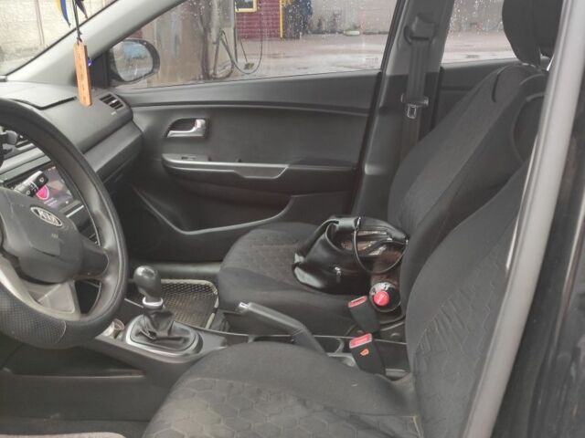 Черный Киа Рио, объемом двигателя 1.4 л и пробегом 94 тыс. км за 6500 $, фото 7 на Automoto.ua