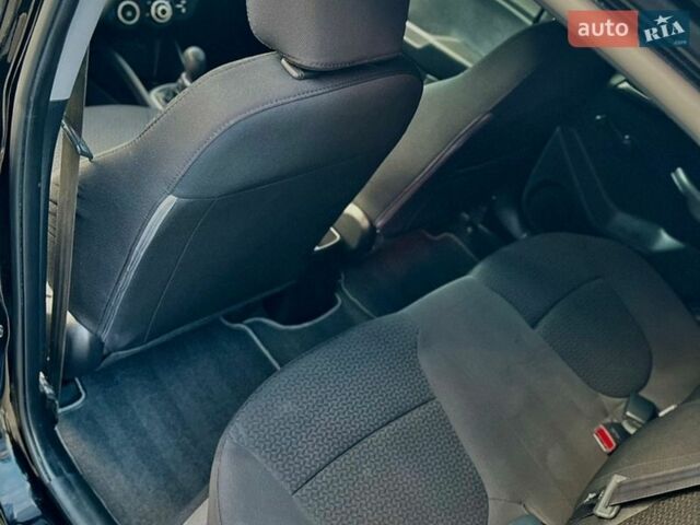 Черный Киа Рио, объемом двигателя 1.4 л и пробегом 95 тыс. км за 7299 $, фото 10 на Automoto.ua