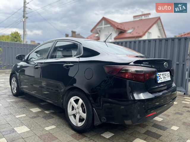 Чорний Кіа Ріо, об'ємом двигуна 1.4 л та пробігом 199 тис. км за 5999 $, фото 4 на Automoto.ua
