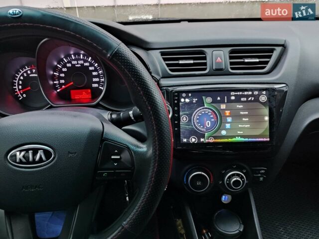 Чорний Кіа Ріо, об'ємом двигуна 1.4 л та пробігом 170 тис. км за 8500 $, фото 2 на Automoto.ua