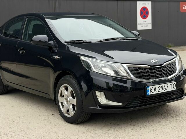 Чорний Кіа Ріо, об'ємом двигуна 1.4 л та пробігом 202 тис. км за 6900 $, фото 6 на Automoto.ua