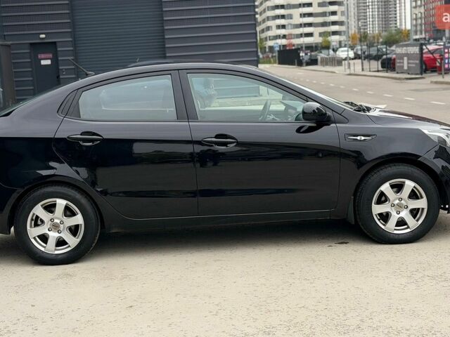 Чорний Кіа Ріо, об'ємом двигуна 1.4 л та пробігом 202 тис. км за 6900 $, фото 5 на Automoto.ua