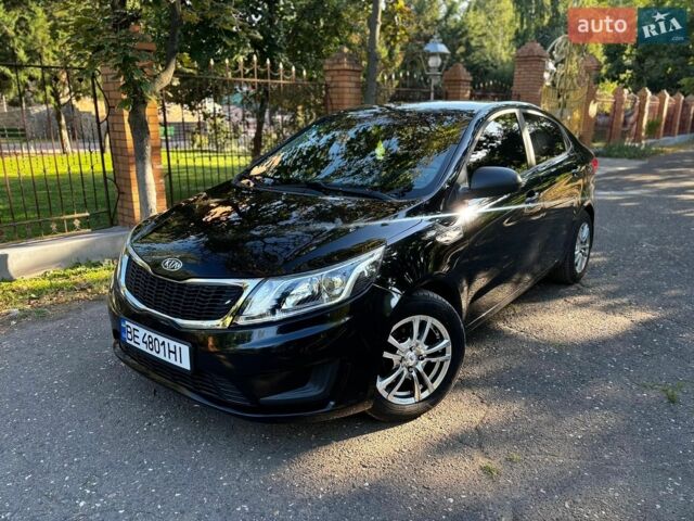 Чорний Кіа Ріо, об'ємом двигуна 1.4 л та пробігом 165 тис. км за 7900 $, фото 1 на Automoto.ua