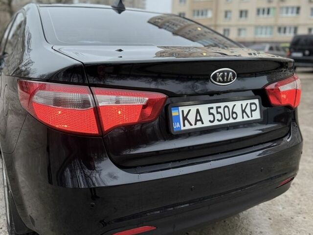 Черный Киа Рио, объемом двигателя 1.6 л и пробегом 210 тыс. км за 8000 $, фото 2 на Automoto.ua