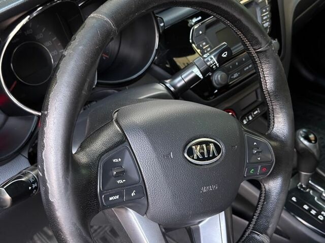 Чорний Кіа Ріо, об'ємом двигуна 1.6 л та пробігом 104 тис. км за 8500 $, фото 9 на Automoto.ua