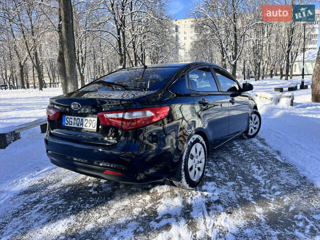 Чорний Кіа Ріо, об'ємом двигуна 1.4 л та пробігом 245 тис. км за 7600 $, фото 13 на Automoto.ua