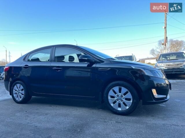 Чорний Кіа Ріо, об'ємом двигуна 1.59 л та пробігом 197 тис. км за 5888 $, фото 4 на Automoto.ua