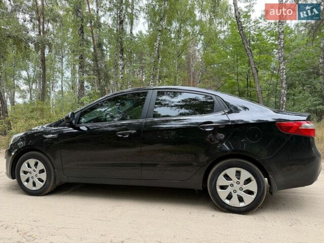 Чорний Кіа Ріо, об'ємом двигуна 1.4 л та пробігом 193 тис. км за 6300 $, фото 10 на Automoto.ua