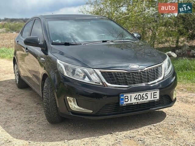 Черный Киа Рио, объемом двигателя 1.4 л и пробегом 108 тыс. км за 7950 $, фото 1 на Automoto.ua