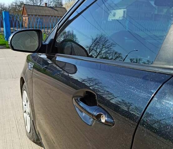 Черный Киа Рио, объемом двигателя 1.4 л и пробегом 125 тыс. км за 6700 $, фото 7 на Automoto.ua