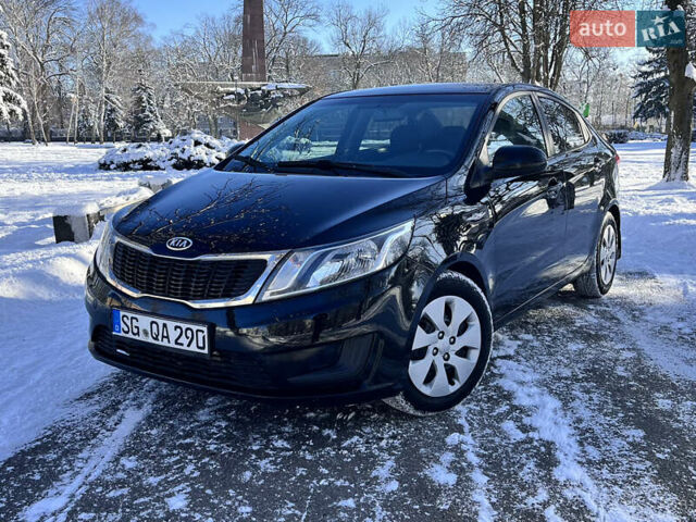 Чорний Кіа Ріо, об'ємом двигуна 1.4 л та пробігом 245 тис. км за 7600 $, фото 10 на Automoto.ua