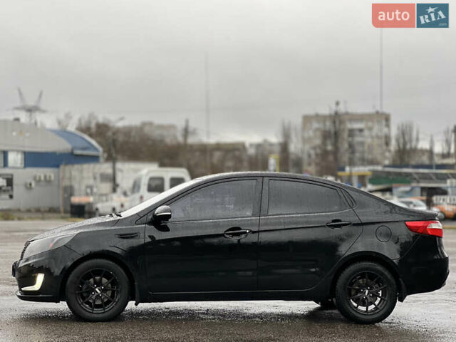 Черный Киа Рио, объемом двигателя 1.6 л и пробегом 231 тыс. км за 7999 $, фото 4 на Automoto.ua