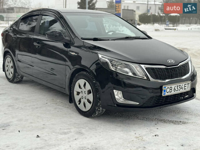 Черный Киа Рио, объемом двигателя 1.4 л и пробегом 155 тыс. км за 7500 $, фото 4 на Automoto.ua