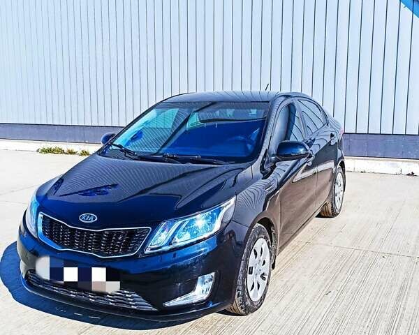 Черный Киа Рио, объемом двигателя 1.4 л и пробегом 125 тыс. км за 6700 $, фото 1 на Automoto.ua