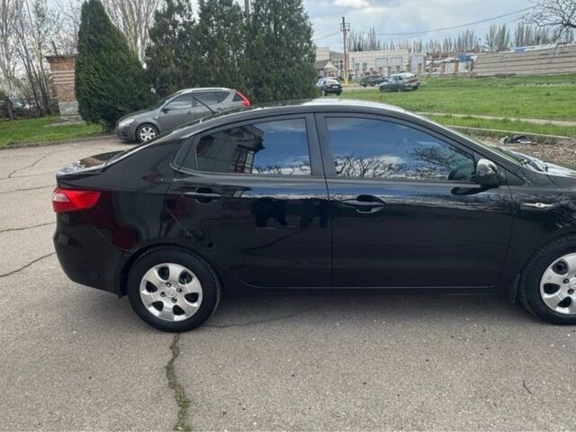 Чорний Кіа Ріо, об'ємом двигуна 1.6 л та пробігом 273 тис. км за 6200 $, фото 3 на Automoto.ua