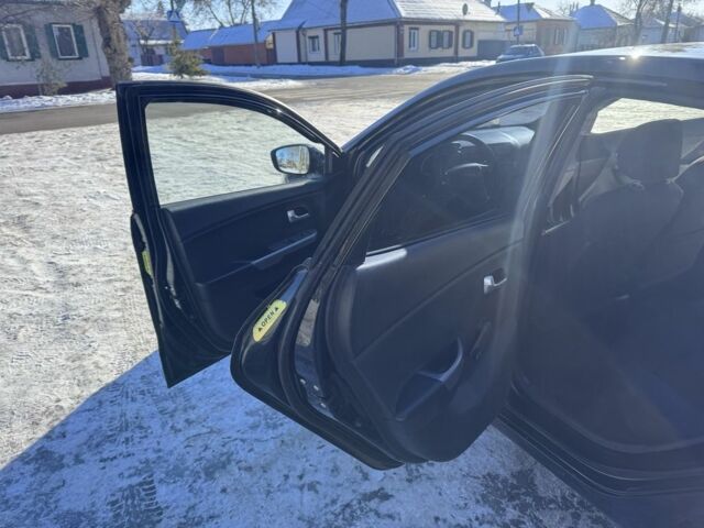 Черный Киа Рио, объемом двигателя 1.4 л и пробегом 160 тыс. км за 7200 $, фото 9 на Automoto.ua
