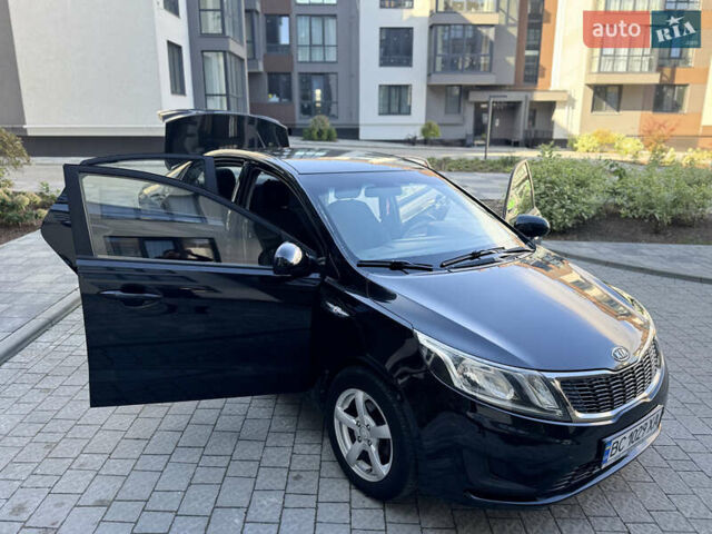 Чорний Кіа Ріо, об'ємом двигуна 1.4 л та пробігом 199 тис. км за 5950 $, фото 23 на Automoto.ua