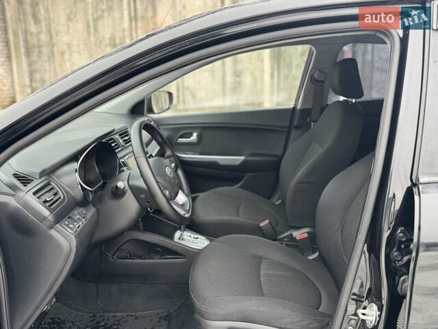 Черный Киа Рио, объемом двигателя 1.4 л и пробегом 155 тыс. км за 7500 $, фото 21 на Automoto.ua