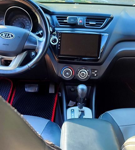 Черный Киа Рио, объемом двигателя 1.4 л и пробегом 120 тыс. км за 7700 $, фото 1 на Automoto.ua