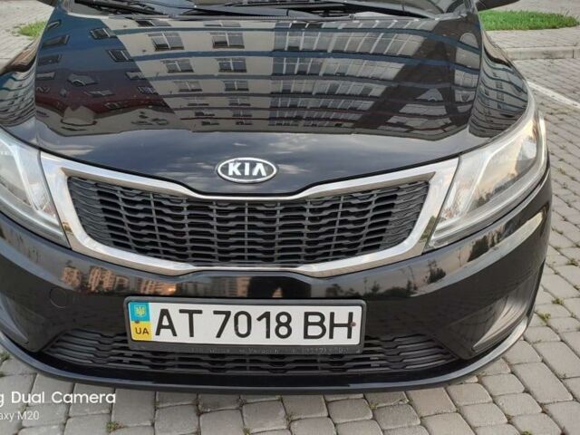 Чорний Кіа Ріо, об'ємом двигуна 1.4 л та пробігом 80 тис. км за 8700 $, фото 11 на Automoto.ua