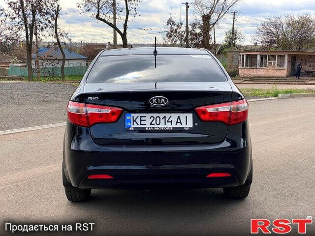 Чорний Кіа Ріо, об'ємом двигуна 1.4 л та пробігом 170 тис. км за 7800 $, фото 2 на Automoto.ua