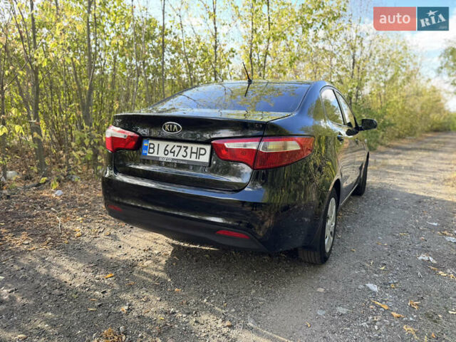 Черный Киа Рио, объемом двигателя 1.4 л и пробегом 173 тыс. км за 7300 $, фото 9 на Automoto.ua
