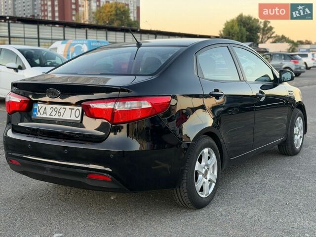 Черный Киа Рио, объемом двигателя 1.4 л и пробегом 201 тыс. км за 6900 $, фото 4 на Automoto.ua