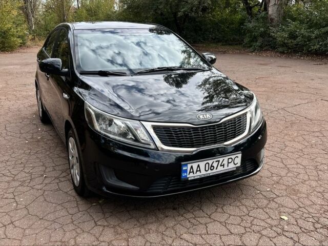 Киа Рио 2012 в Кривом Роге на Automoto.ua Черный Киа Рио, объемом двигателя 1.4 л и пробегом 162 тыс. км за 7800 $, фото 5 на Automoto.ua