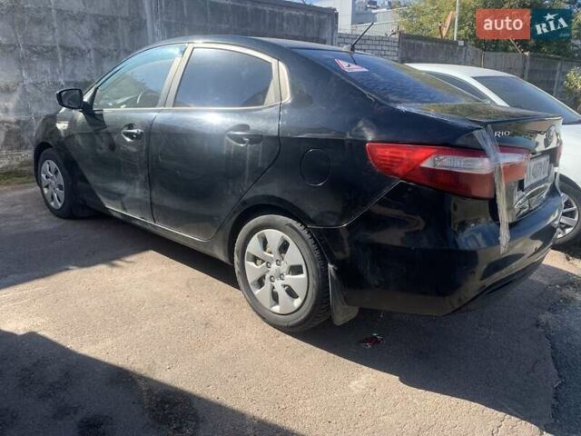 Чорний Кіа Ріо, об'ємом двигуна 1.4 л та пробігом 146 тис. км за 5075 $, фото 12 на Automoto.ua