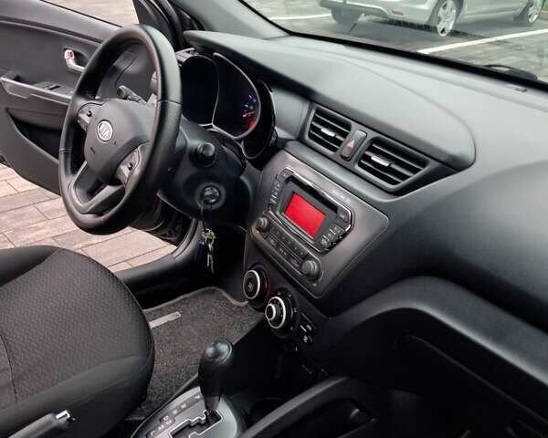 Черный Киа Рио, объемом двигателя 1.4 л и пробегом 244 тыс. км за 6900 $, фото 14 на Automoto.ua