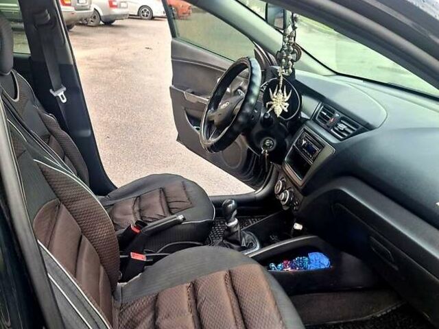 Черный Киа Рио, объемом двигателя 1.4 л и пробегом 197 тыс. км за 7000 $, фото 6 на Automoto.ua