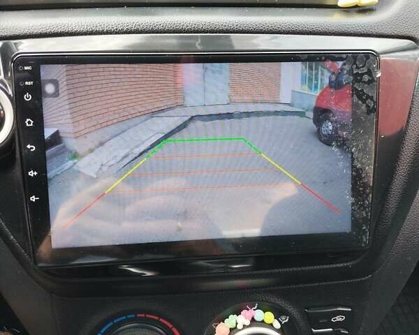 Чорний Кіа Ріо, об'ємом двигуна 1.4 л та пробігом 123 тис. км за 7600 $, фото 10 на Automoto.ua