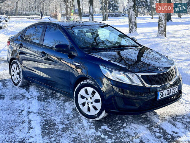 Чорний Кіа Ріо, об'ємом двигуна 1.4 л та пробігом 245 тис. км за 7600 $, фото 7 на Automoto.ua