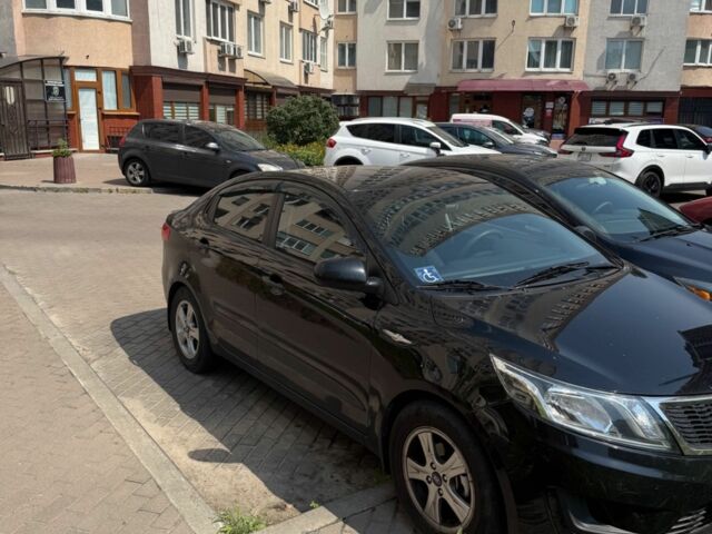 Черный Киа Рио, объемом двигателя 1.4 л и пробегом 115 тыс. км за 8401 $, фото 2 на Automoto.ua