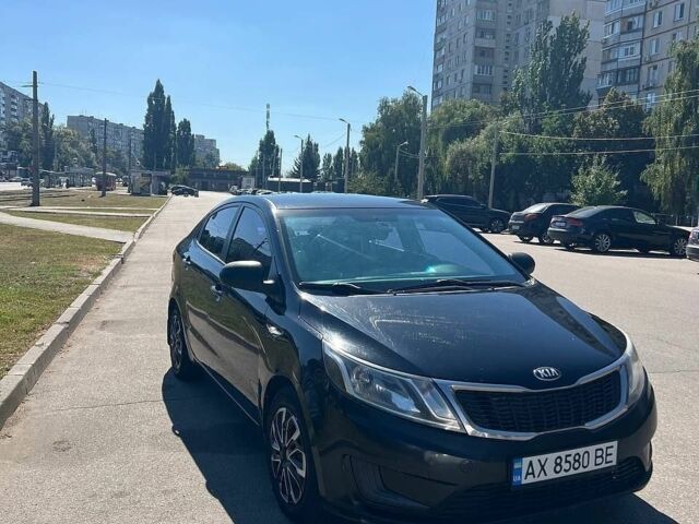 Черный Киа Рио, объемом двигателя 1.4 л и пробегом 200 тыс. км за 6500 $, фото 9 на Automoto.ua