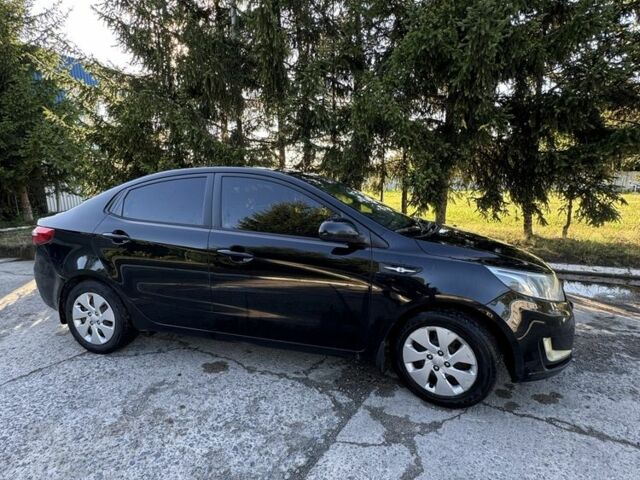Черный Киа Рио, объемом двигателя 1.4 л и пробегом 179 тыс. км за 7998 $, фото 2 на Automoto.ua