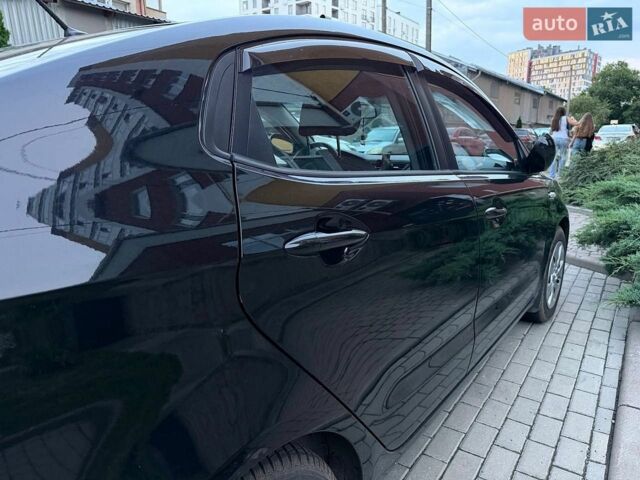 Чорний Кіа Ріо, об'ємом двигуна 1.4 л та пробігом 87 тис. км за 7700 $, фото 6 на Automoto.ua