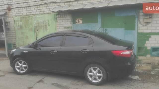 Черный Киа Рио, объемом двигателя 1.4 л и пробегом 120 тыс. км за 8500 $, фото 6 на Automoto.ua