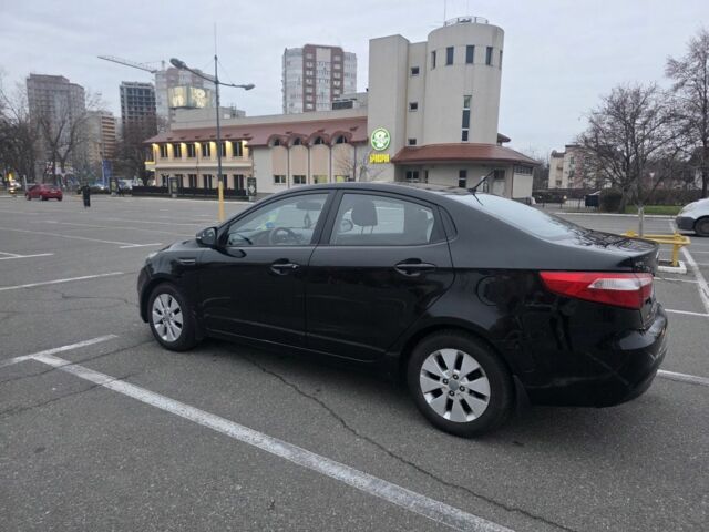 Черный Киа Рио, объемом двигателя 1.6 л и пробегом 150 тыс. км за 9000 $, фото 2 на Automoto.ua