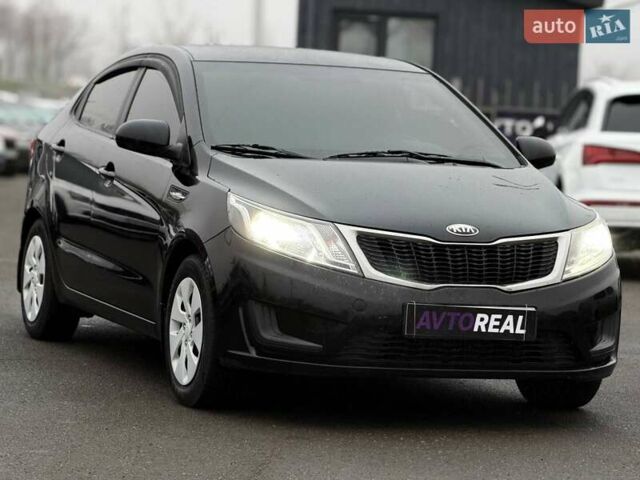 Черный Киа Рио, объемом двигателя 1.4 л и пробегом 220 тыс. км за 8200 $, фото 6 на Automoto.ua