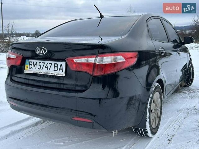 Черный Киа Рио, объемом двигателя 1.59 л и пробегом 107 тыс. км за 7950 $, фото 3 на Automoto.ua