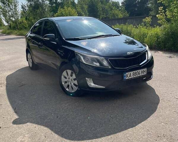 Чорний Кіа Ріо, об'ємом двигуна 1.59 л та пробігом 261 тис. км за 8200 $, фото 1 на Automoto.ua