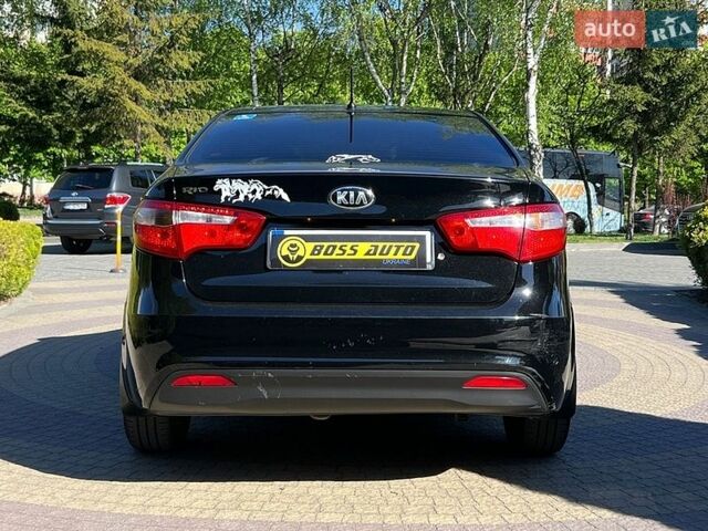 Черный Киа Рио, объемом двигателя 1.4 л и пробегом 215 тыс. км за 6999 $, фото 5 на Automoto.ua