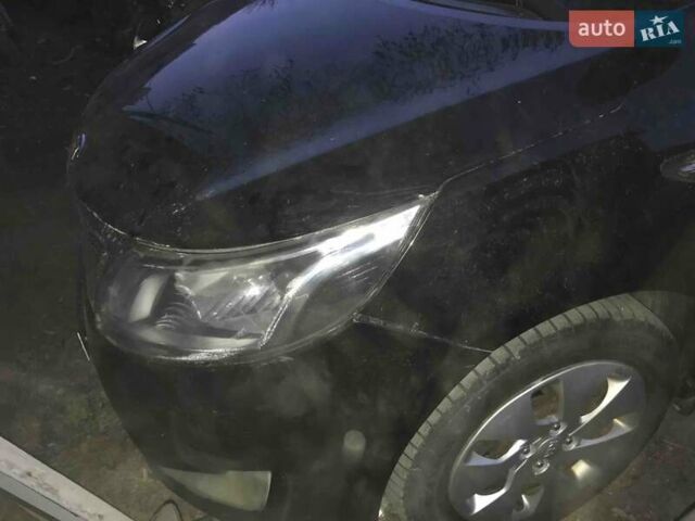 Чорний Кіа Ріо, об'ємом двигуна 1.4 л та пробігом 102 тис. км за 4444 $, фото 5 на Automoto.ua