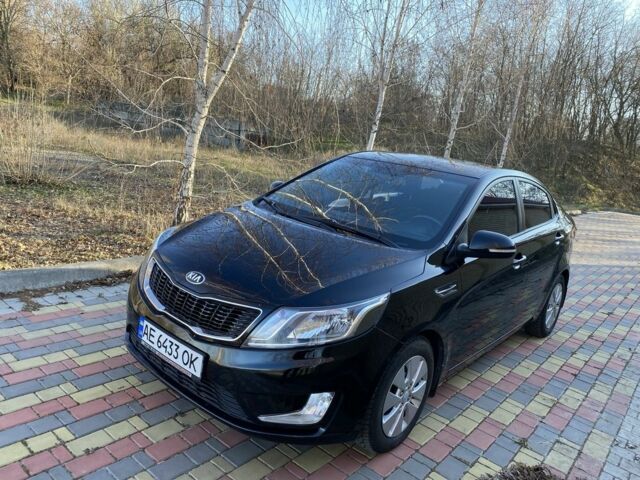 Чорний Кіа Ріо, об'ємом двигуна 1.6 л та пробігом 170 тис. км за 8600 $, фото 1 на Automoto.ua